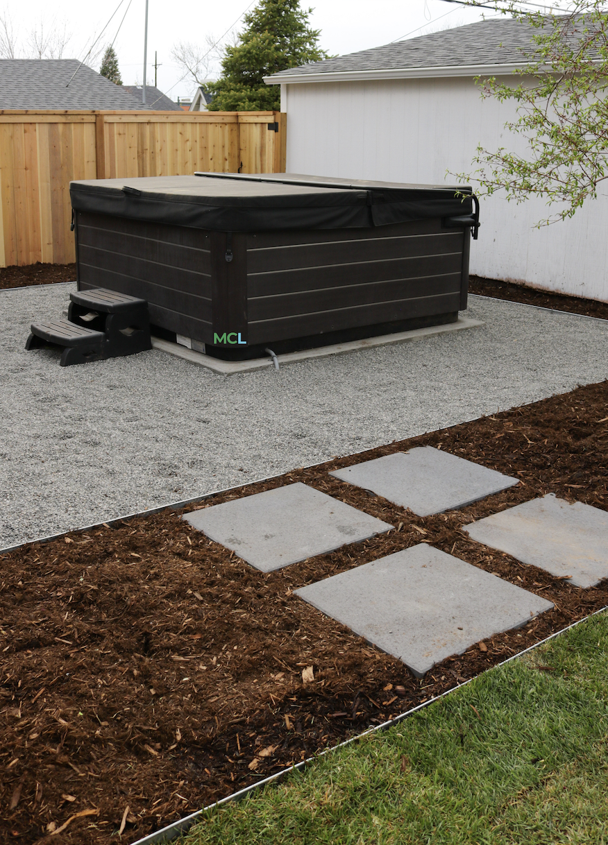 rocks and hot tub pad